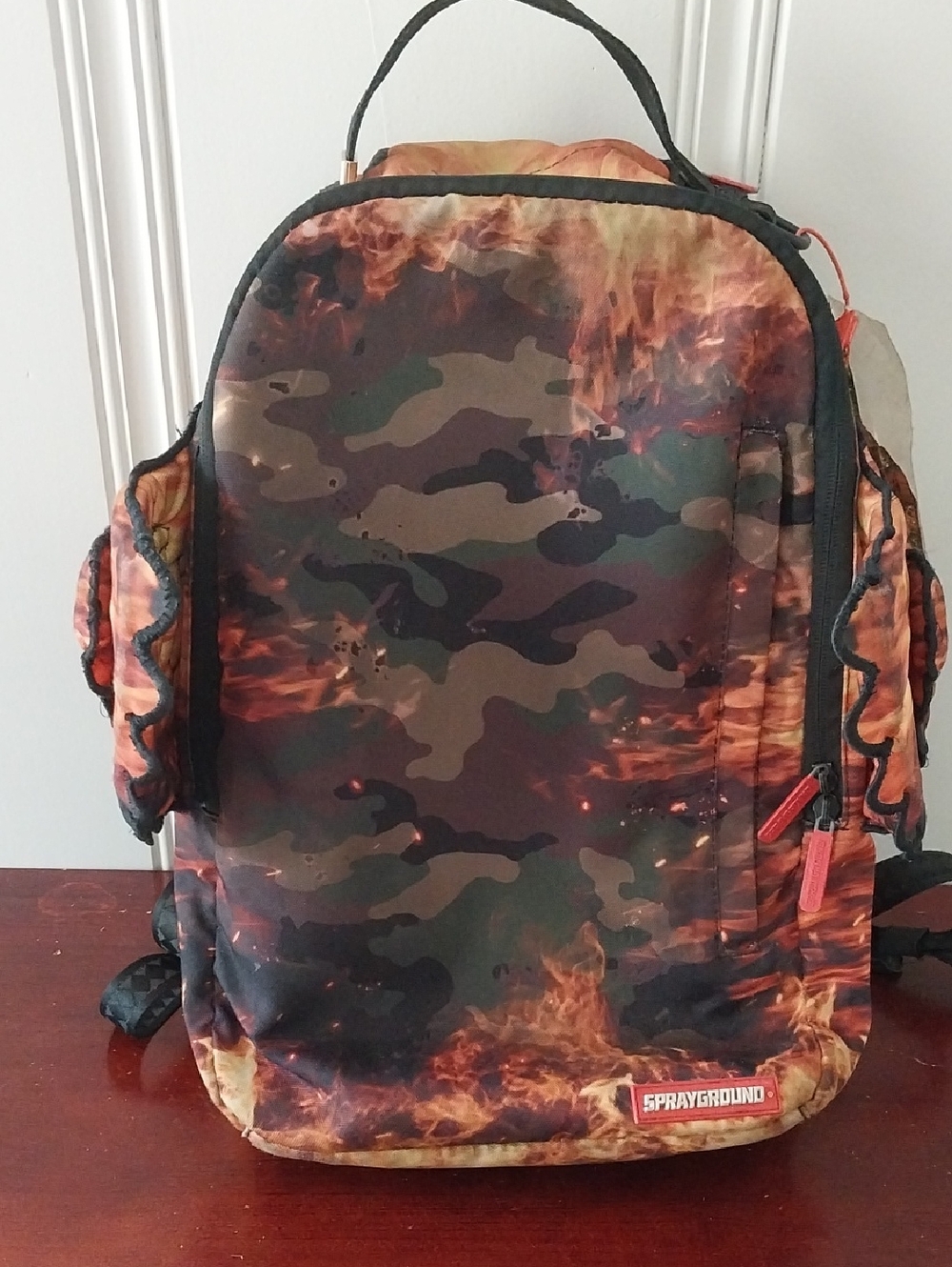 Sprayground Lil T Jay Fallin Angel 4 Wing Black Brown Orange Flame Camo Backpack